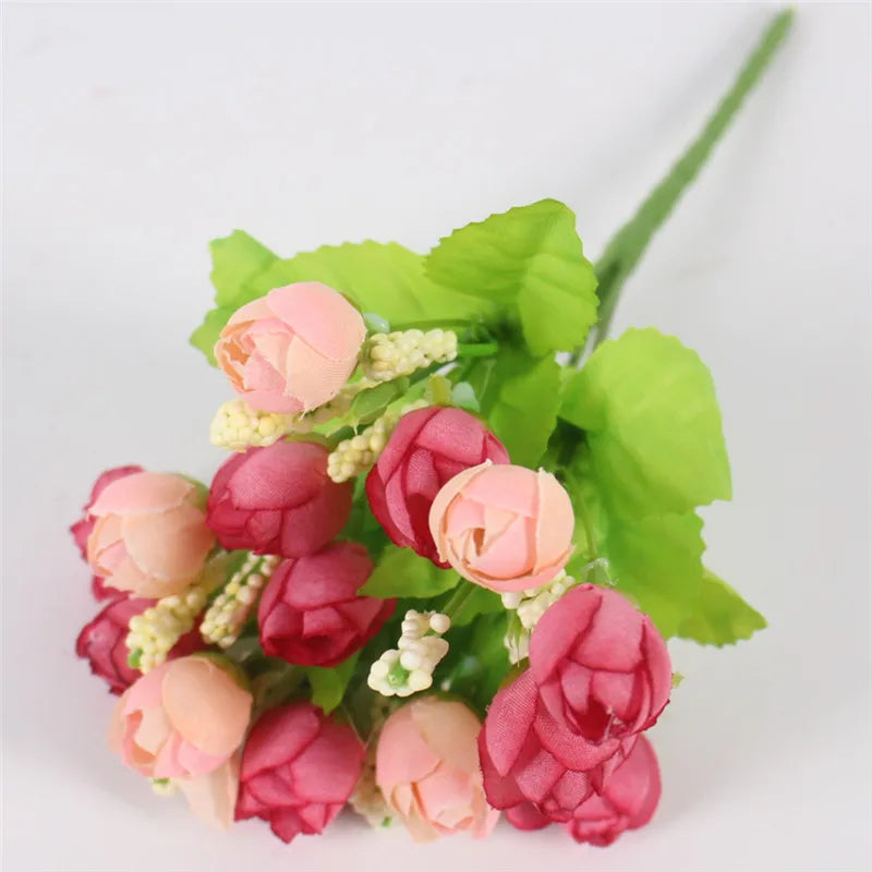 Coral pink small bud rose bouquet with realistic petals and leaves