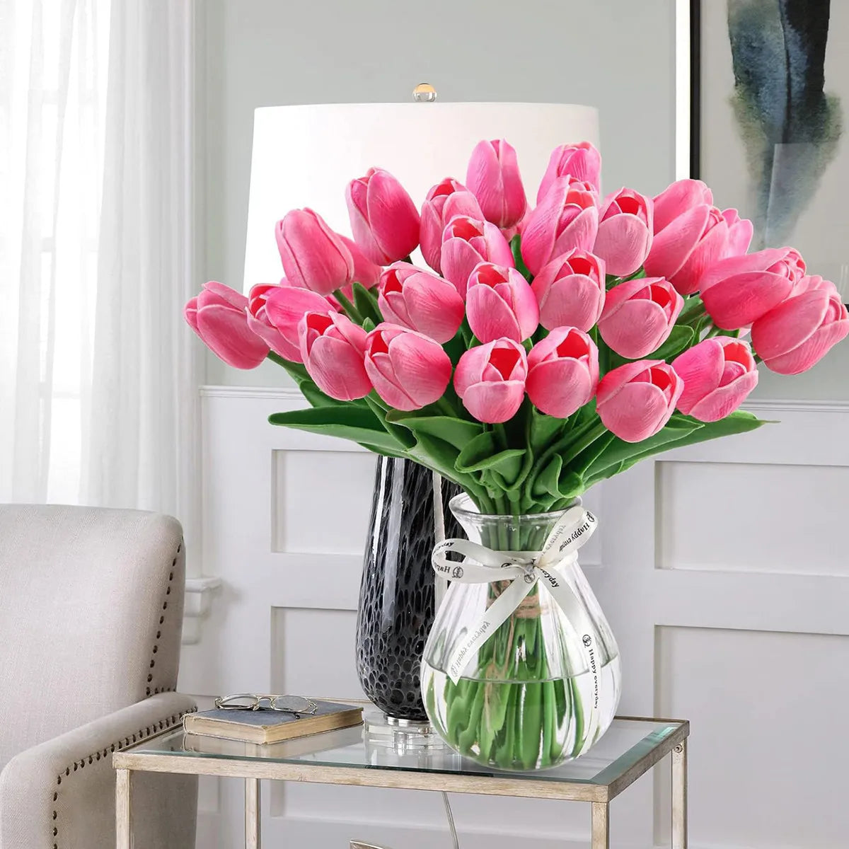 Hot pink artificial tulips in clear vase - vibrant event decoration