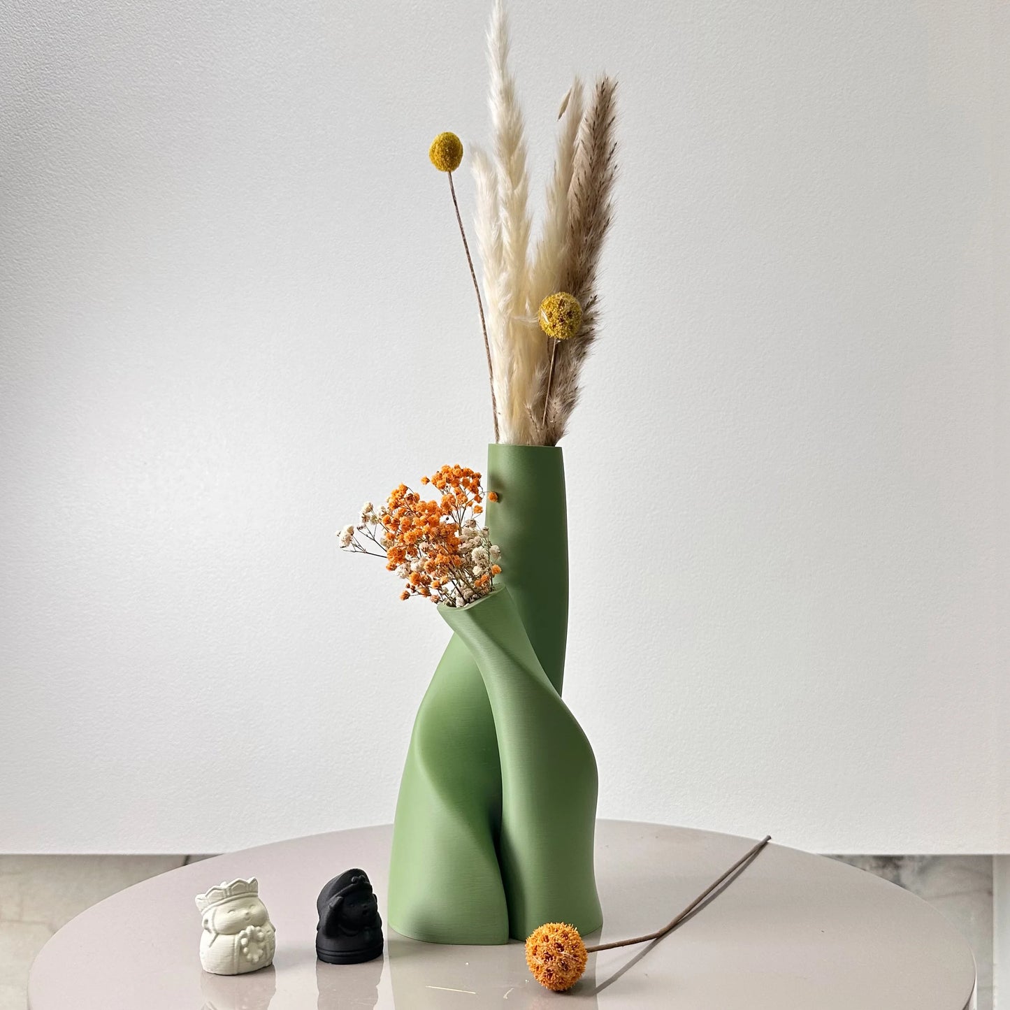 Plastic matcha green double vase with dried flowers arrangement display