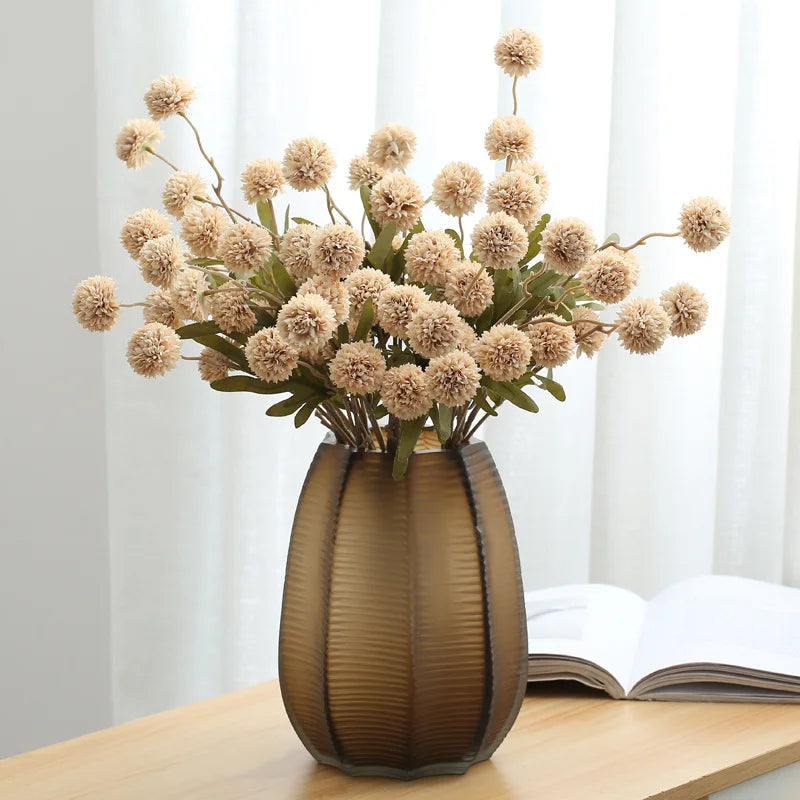 Champagne artificial dandelion in decorative vase
