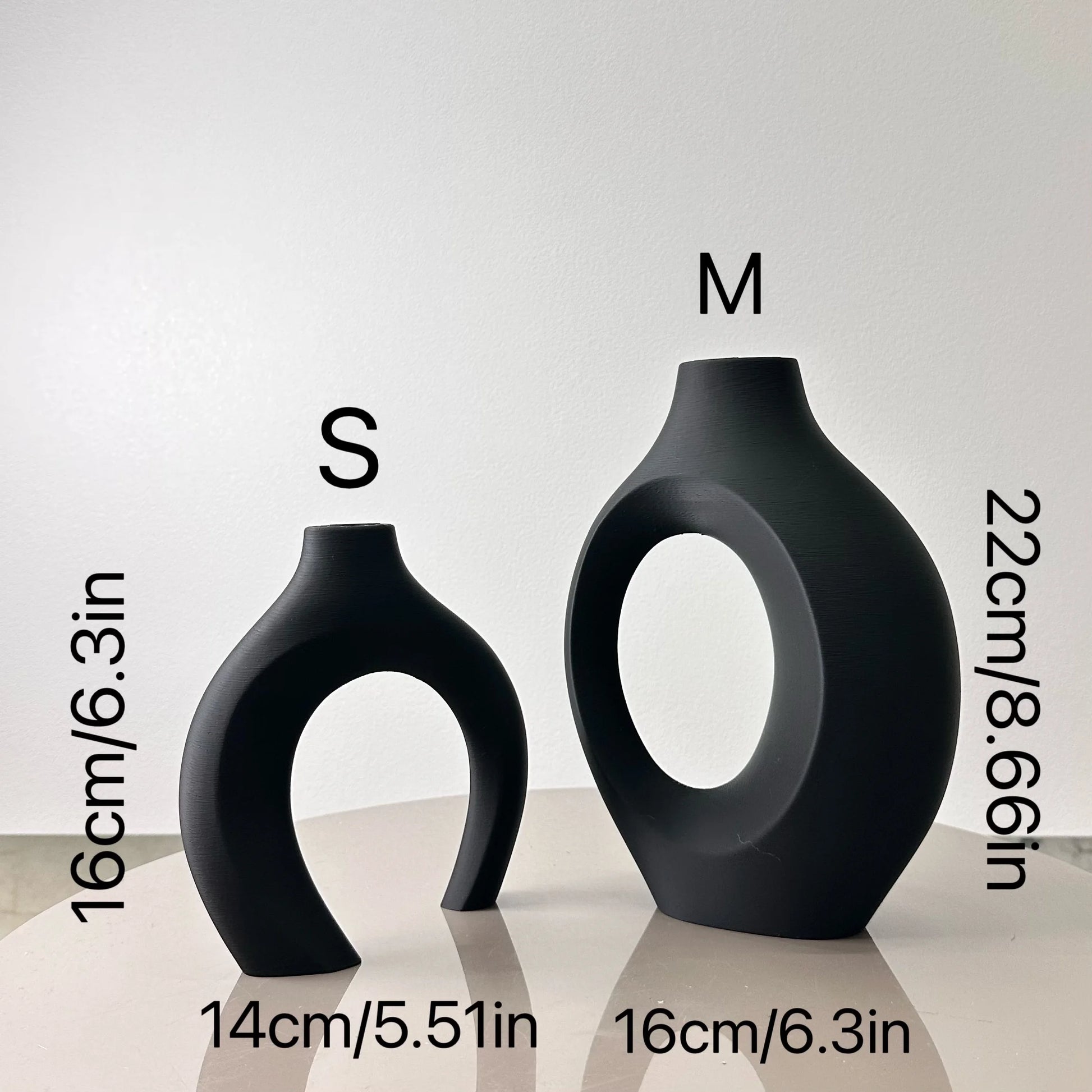Small and medium plastic hug vase embracing design detail view