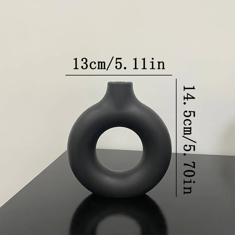 Havana Nordic small black plastic vase side view - hollow circular pattern detail