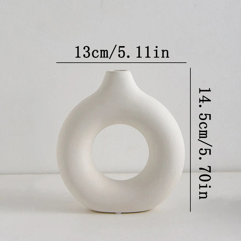 Havana Nordic small white plastic vase detail view - hollow circular pattern close-up