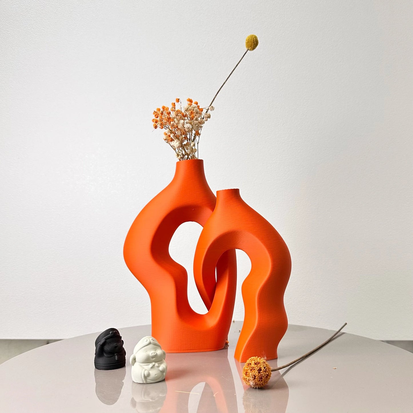 Orange twisty artistic vases set of 2 - vibrant modern tabletop decor
